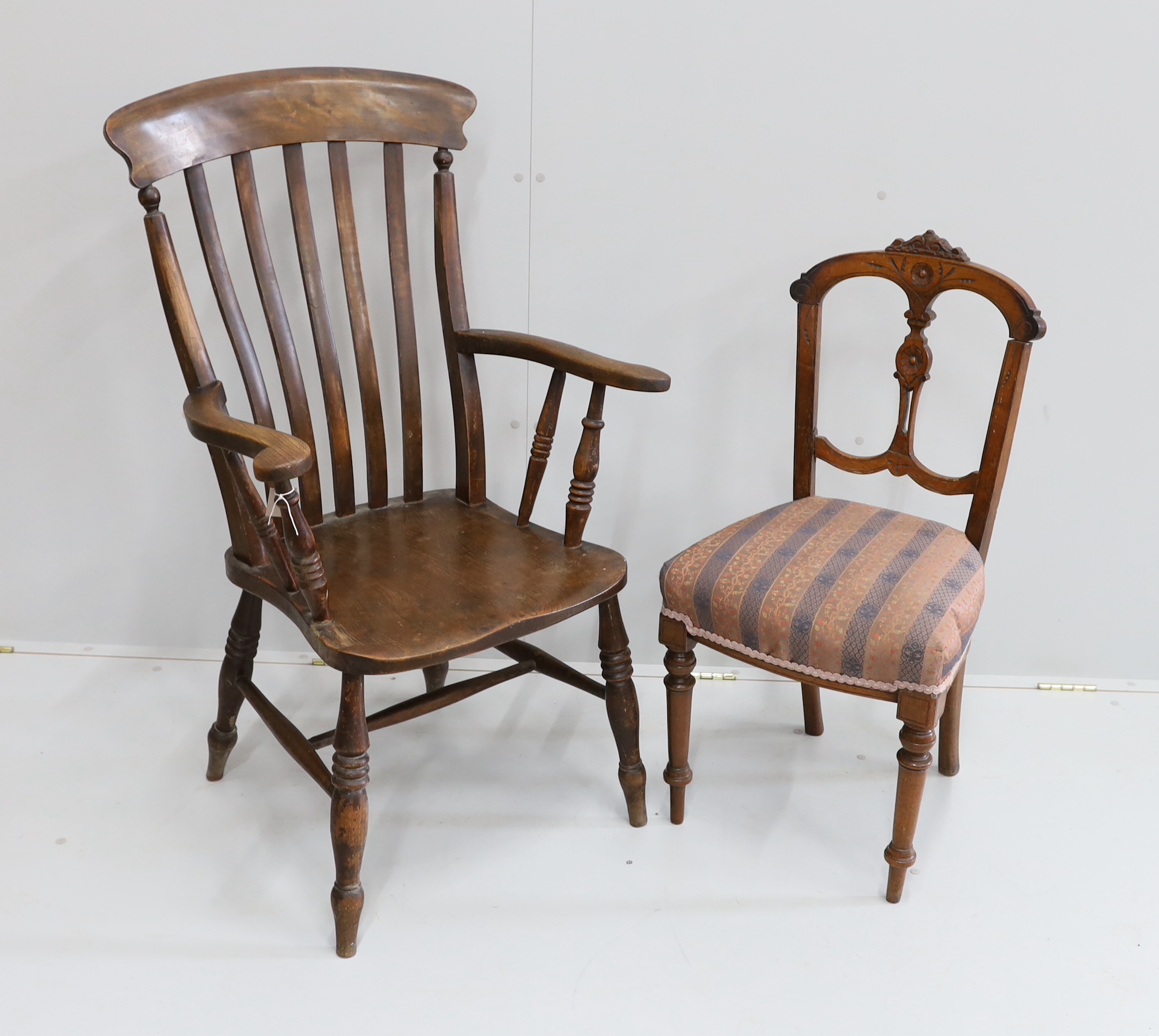 A Victorian elm and beech Windsor lathe back armchair, width 65cm, height 111cm, together with a Victorian walnut dining chair